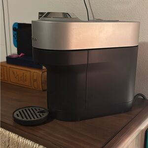 Nespresso Black and Silver Coffee Machine